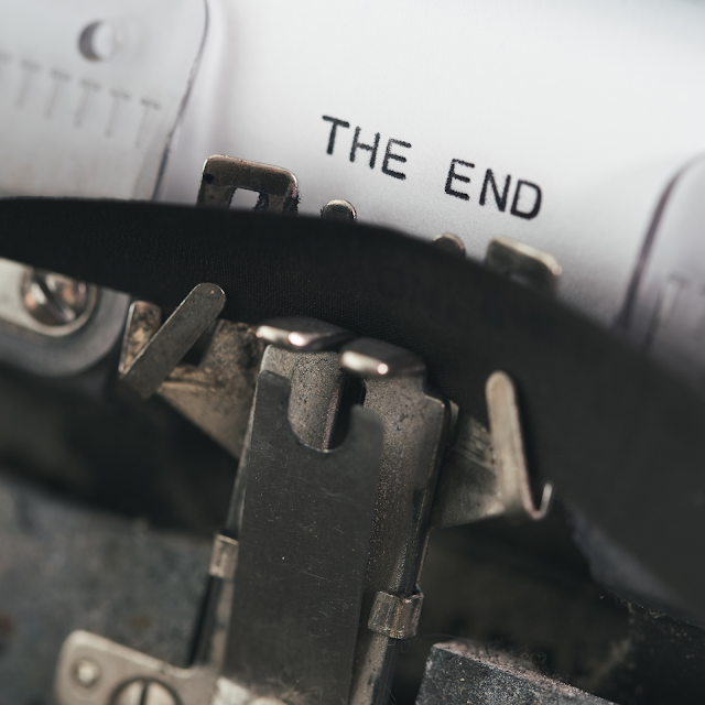 typewriter typing text on pape