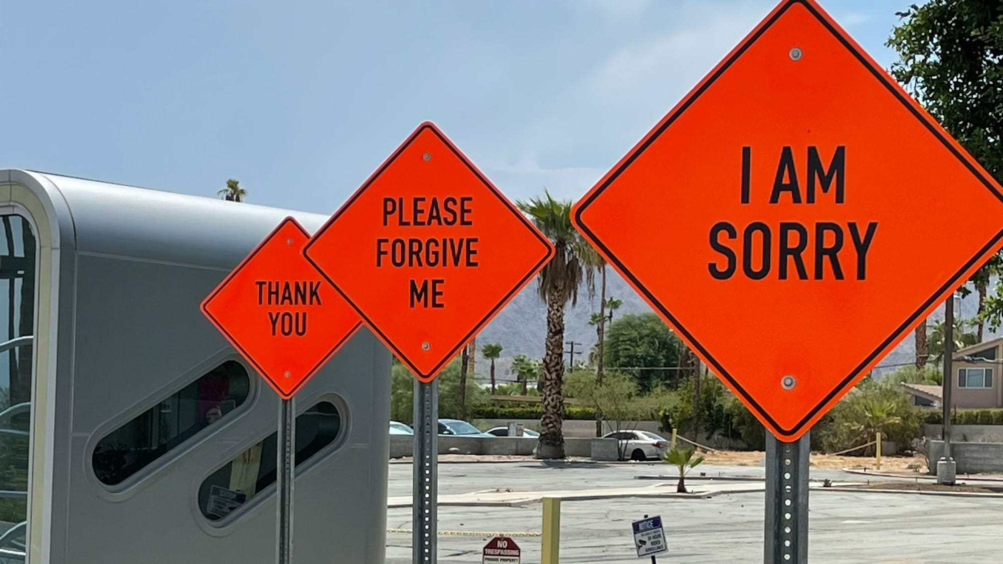 white and red street sign
