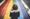 woman on rainbow road