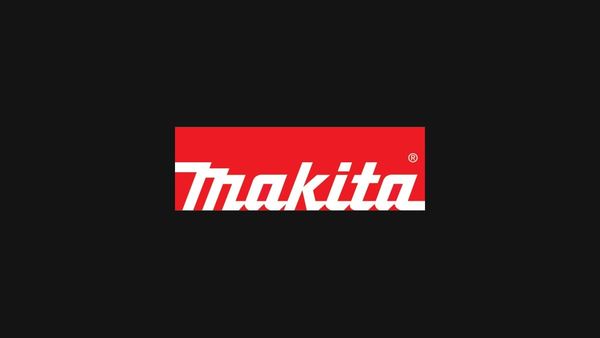 Makita company logo on dark background