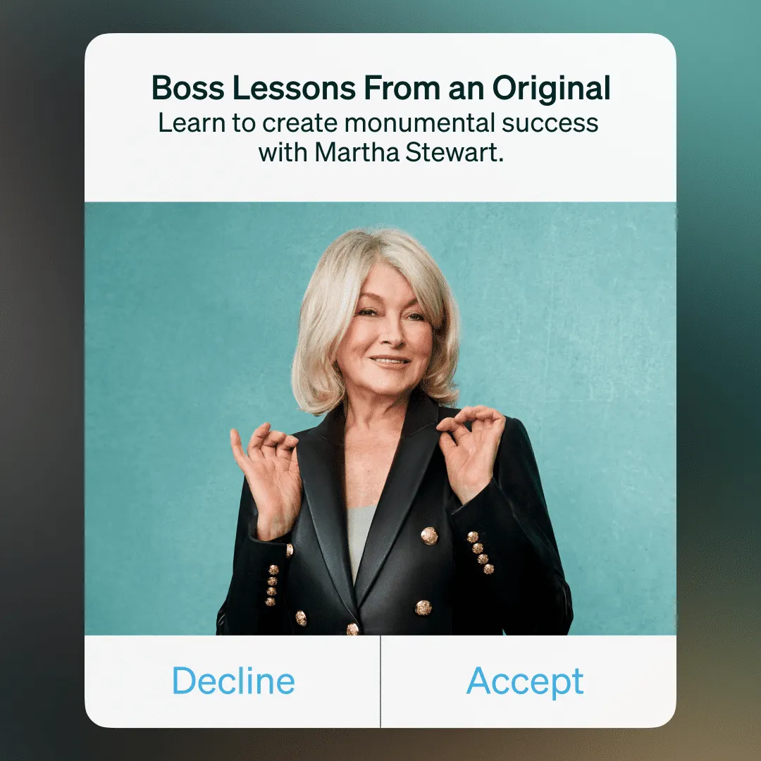 Martha Stewart smiles in a screenshot of a phone message wearing a suit, Masterclass