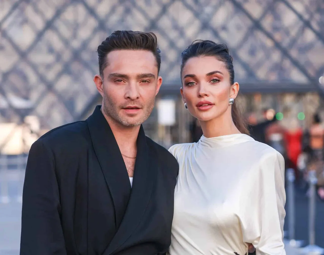 Ed Westwick and Amy Jackson pose together at a press event in Paris.