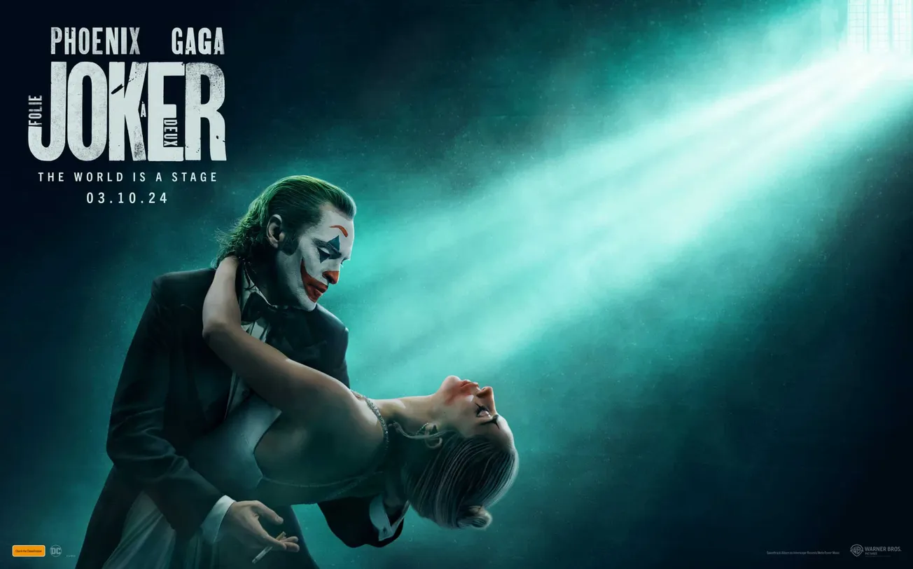 joker folie a deux promo poster showing Joker and Harley Quinn dancing with a light shining through a small window