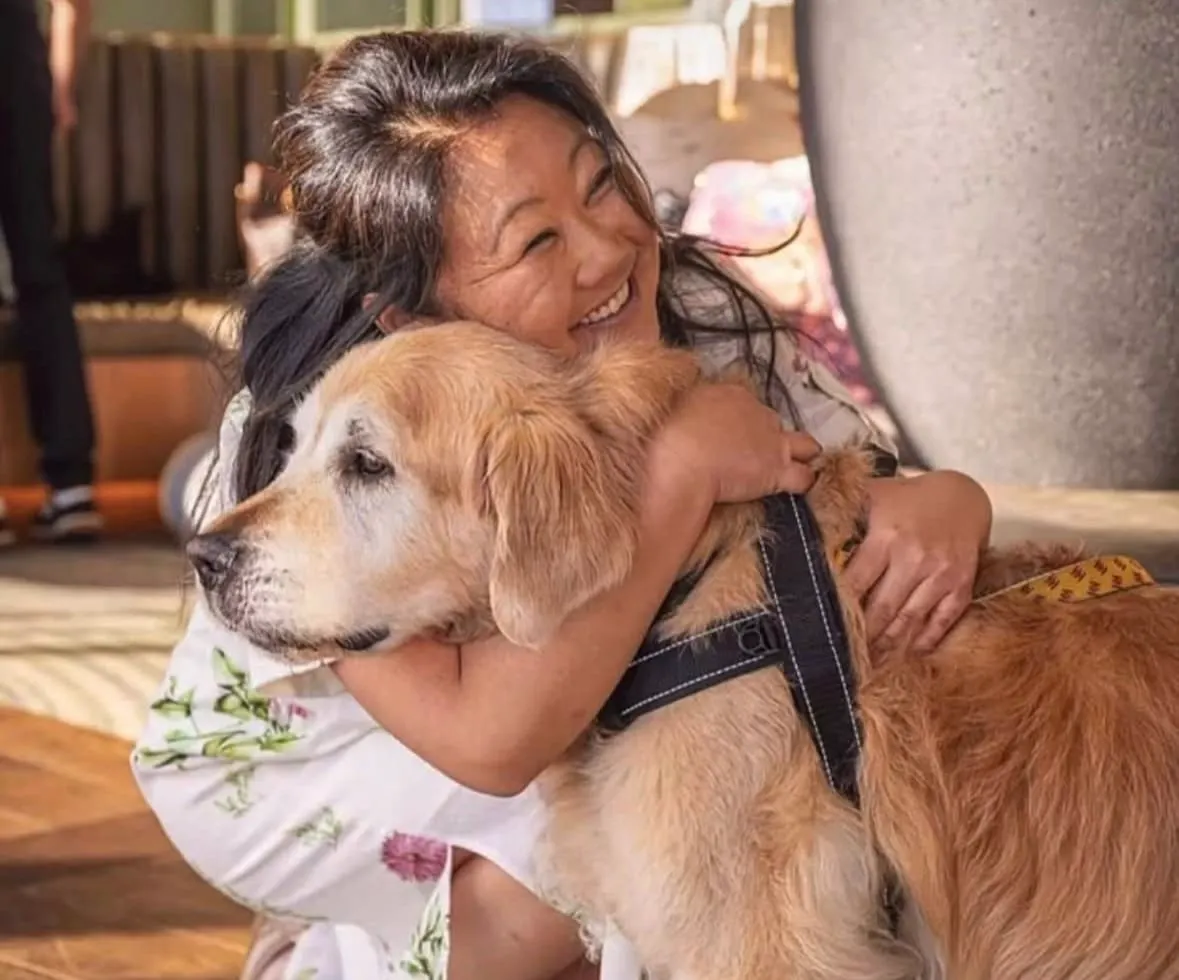 RecipeTin Eats' founder Nagi Maehashi cuddles her dog, Dozer