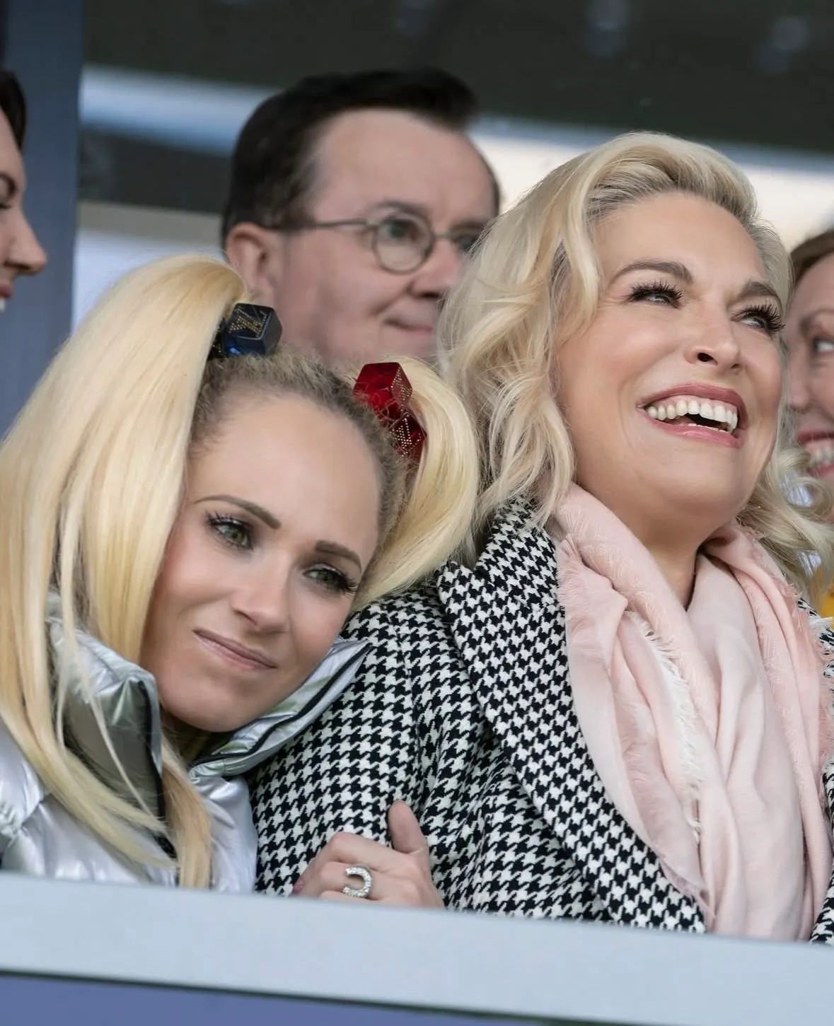Juno Temple as Keeley Jones and Hannah Waddingham as Rebecca Welton in a still from 'Ted Lasso'. Keeley is resting her head o
