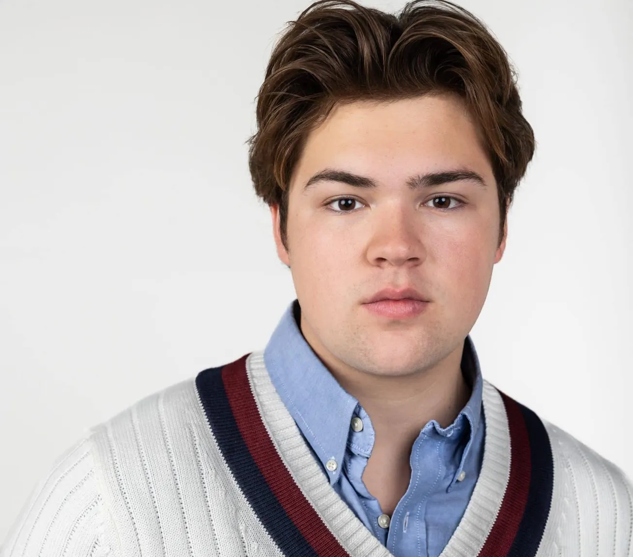 Maxwell Acee Donovan of 'That '90s Show' and co-founder of Nature's Negoitators poses for a photo wearing a white jumper and