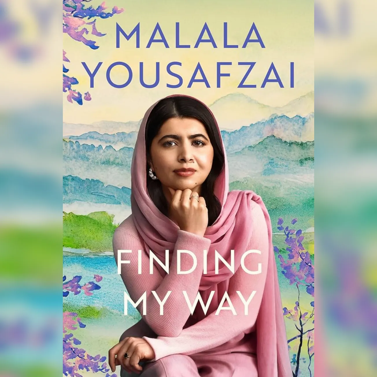 A photo of Malala's Finding My Way book cover. She wears a pink shalwar khameez