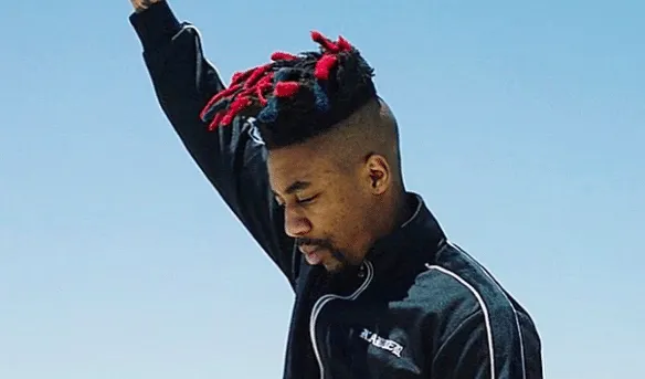 A still from Dax's "Black Lives Matter" video, produced by Barba Sauce and filmed by Damien Sandoval. (Source: YouTube)