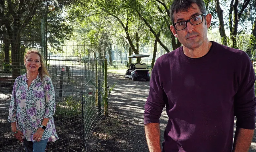 Carole Baskin and Louis Theroux stand outdoors for a new interview.