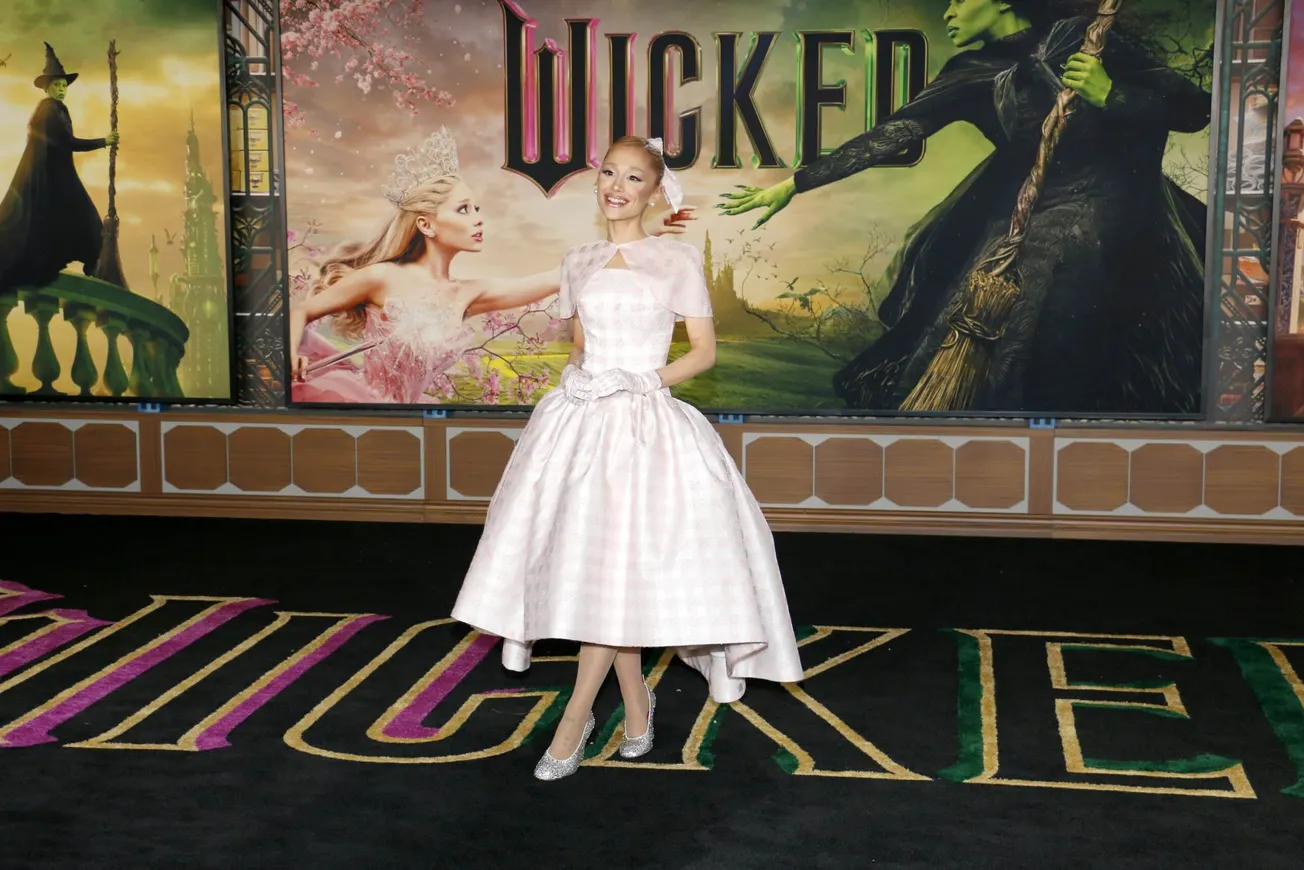 Ariana Grande at the 'Wicked" premiere wearing a pstel pink dress.