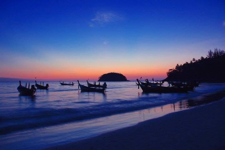 At sunset, fishers' boats in some Thai islands