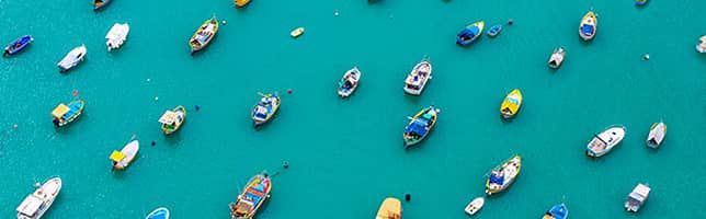 Colorful boats in the port of Marsaxlokk, Malta