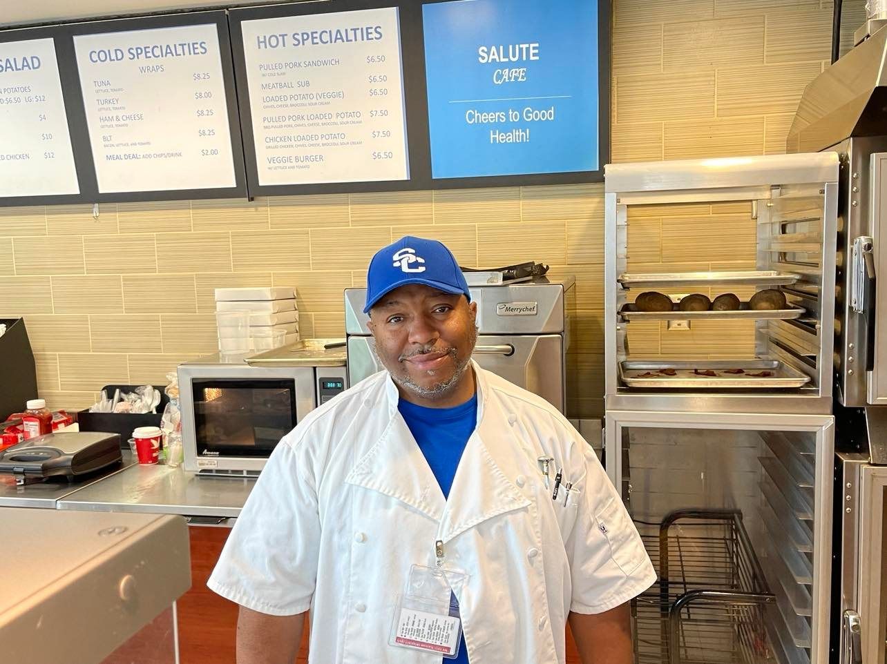 Andre Murphy, founder of the Community Feeding Tour, considers Murphy's Chicken N' Potatoes his signature dish. Photo Credit: Mark Tyler