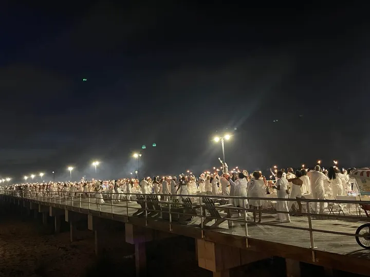 The Boardwalk was awash in white from Oriental to Atlantic avenues for Le Diner en Blanc 2023. Photo Credit: Mark Tyler