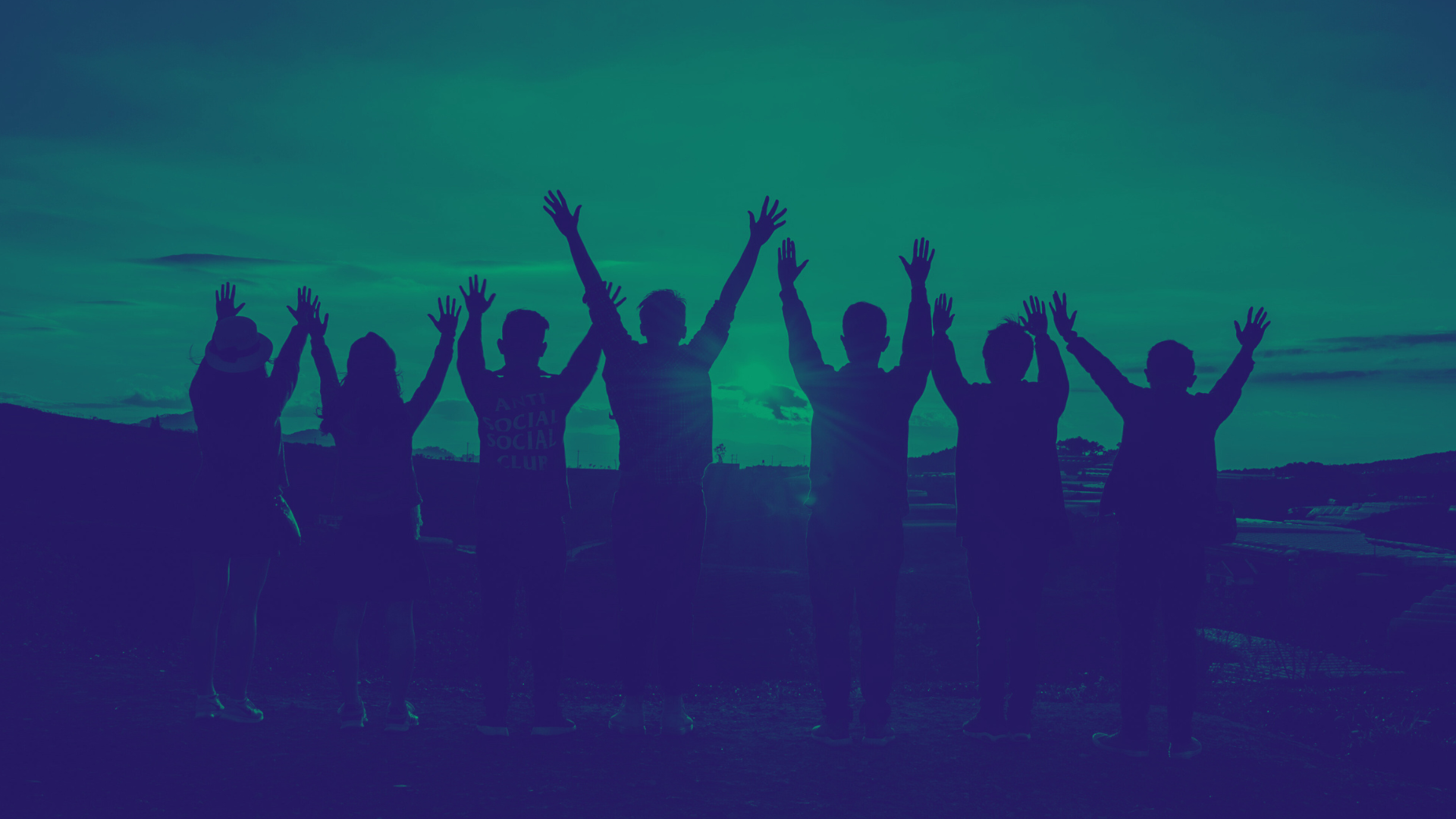 Group of people celebrating together representing the Psyflow peer-to-peer psychedelic integration community