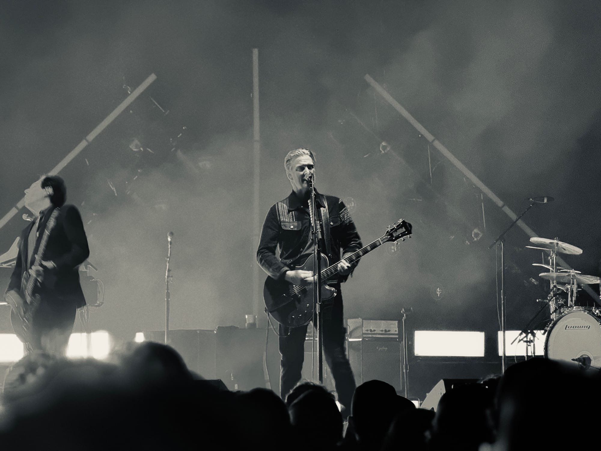Queens of the Stone Age perfoming on stage at the Moody Center in Austin, Texas