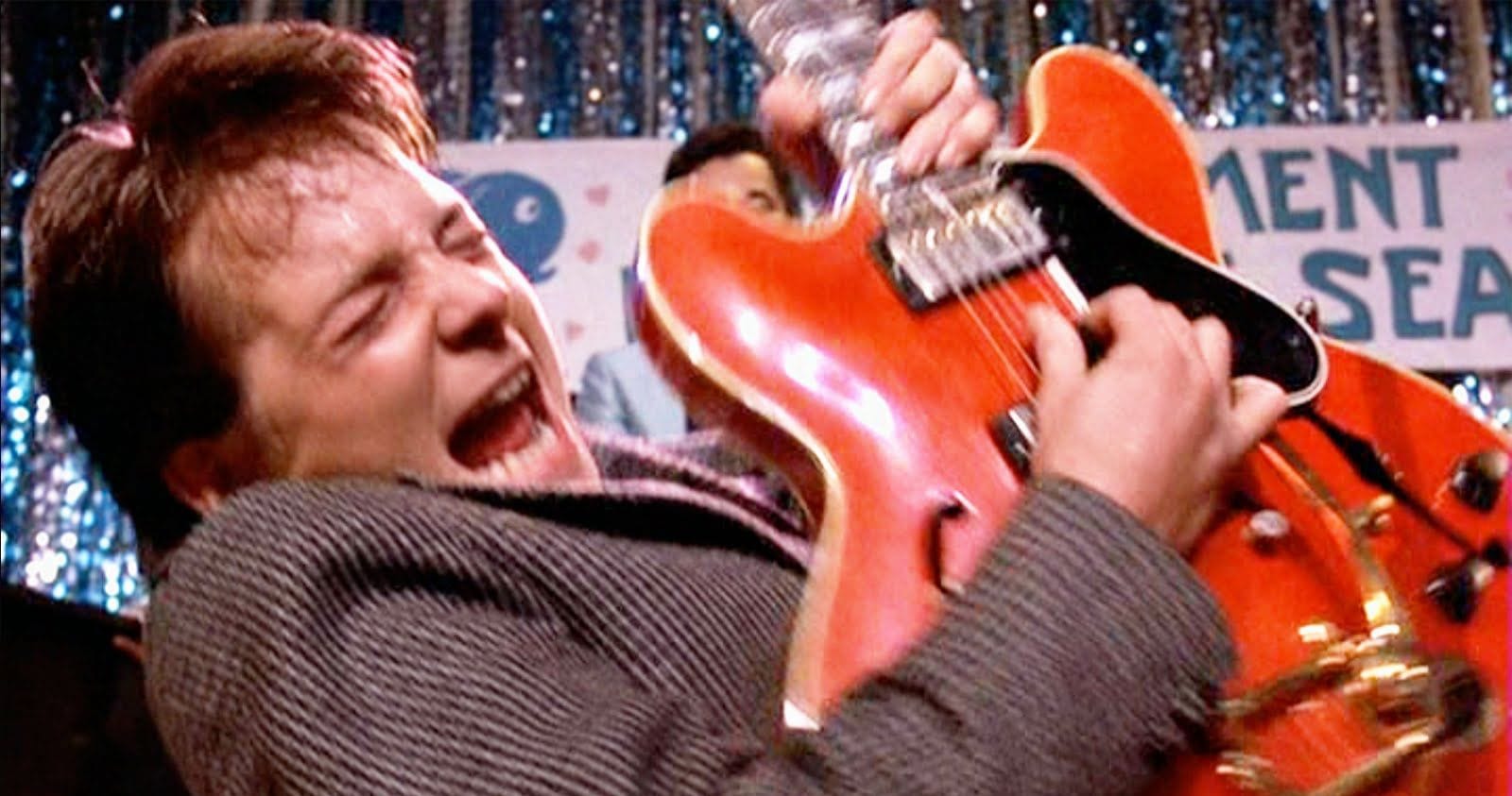 Michael J. Fox as Marty McFly plays guitar in the movie Back to the Future