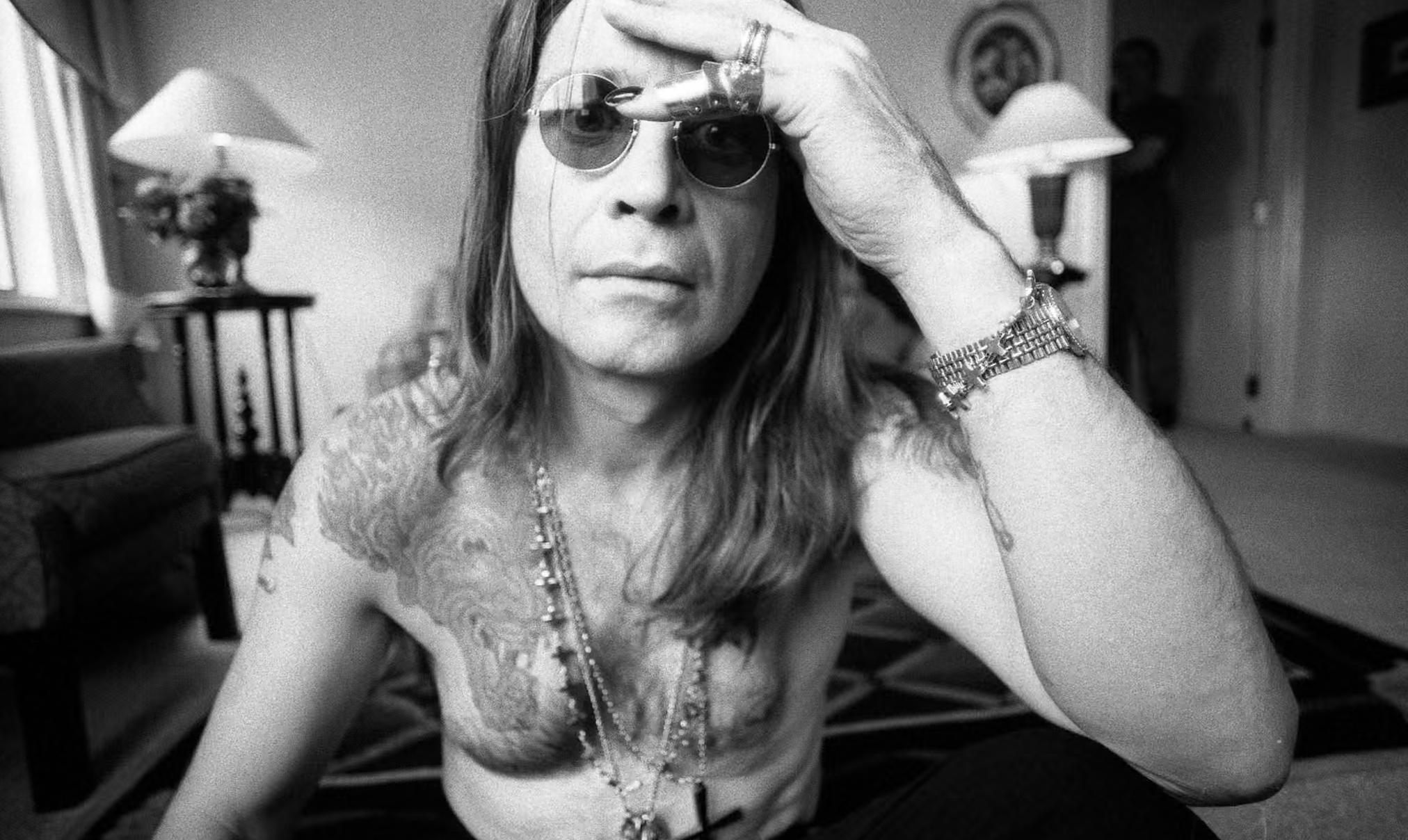 A black and white photo of Ozzy Osbourne