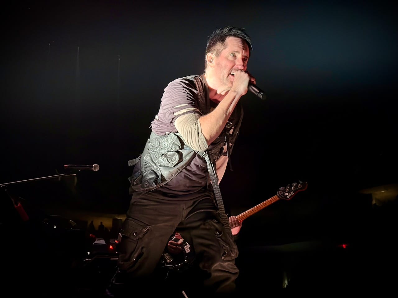 Trent Reznor of Nine Inch Nails performing on stage in Austin, TX.