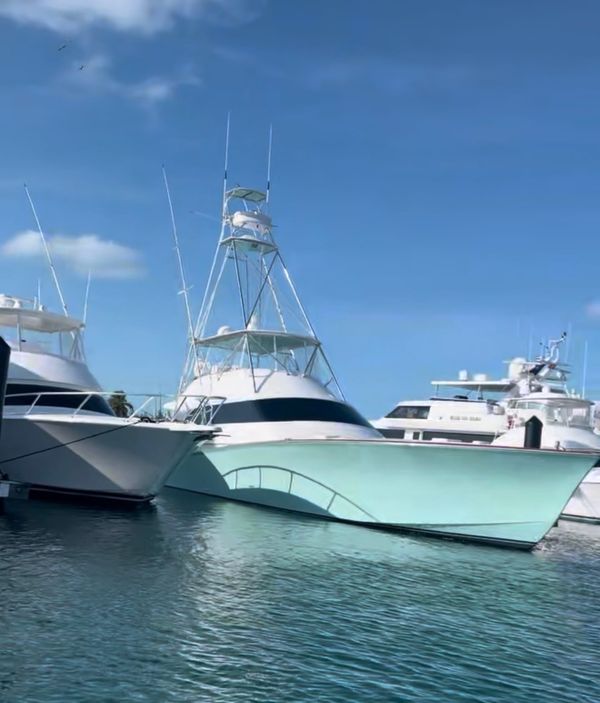 Large sportfish boat docked at waterfront canal home in Pinellas County, Florida