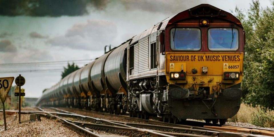 a train with 'saviour of UK music venues' emblazoned on the front thanks to another spectacular photoshop effort