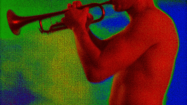 A colorful but noisy image of a man playing a trumpet without a shirt. 