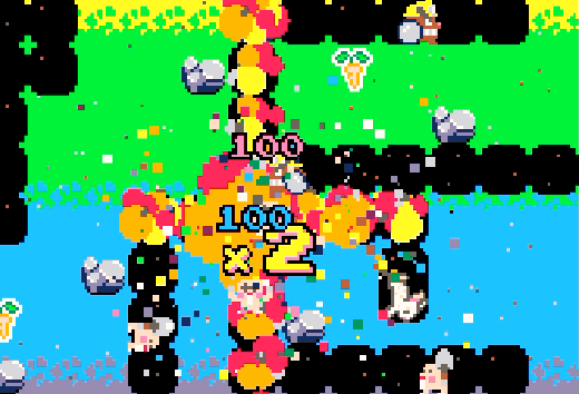 A colorful screenshot - colored layers of dirt, red and orange explosions, colorful numbers, and little mole enemies walking around in air pockets in the dirt