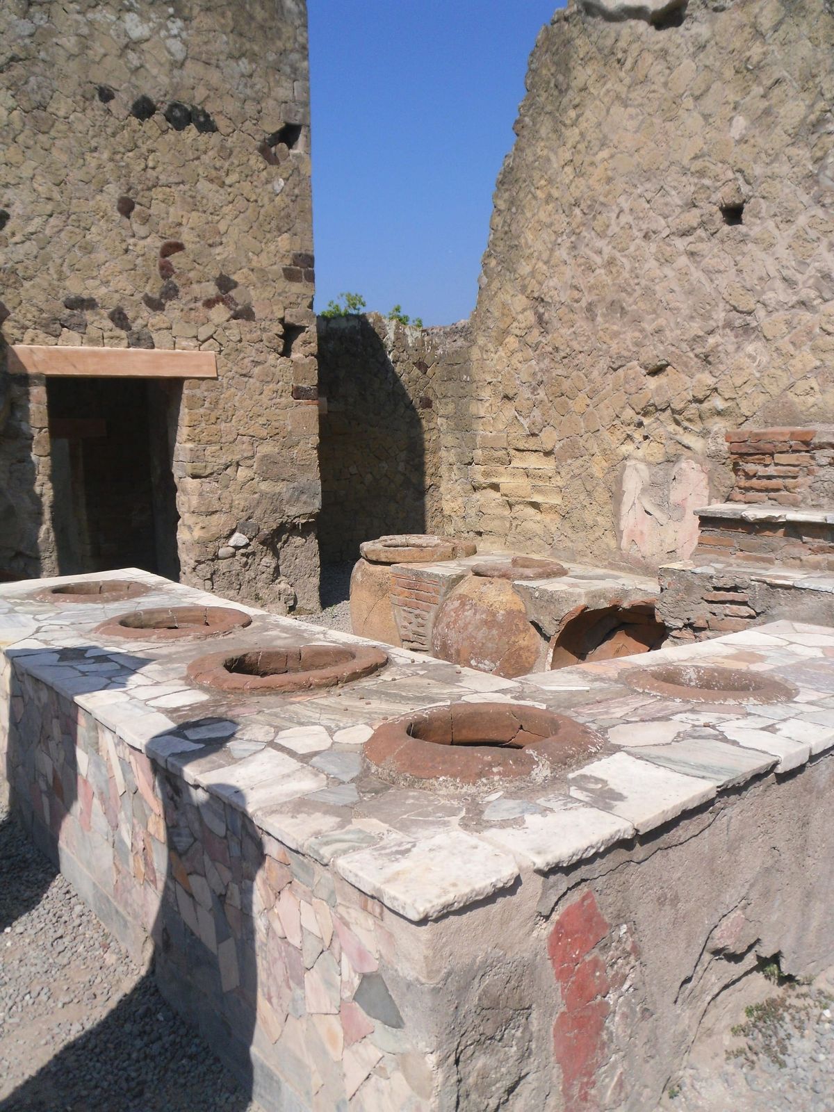Roman thermopolium (equivalent of a modern fast-food) in Herculaneum, Campania, Italy 
