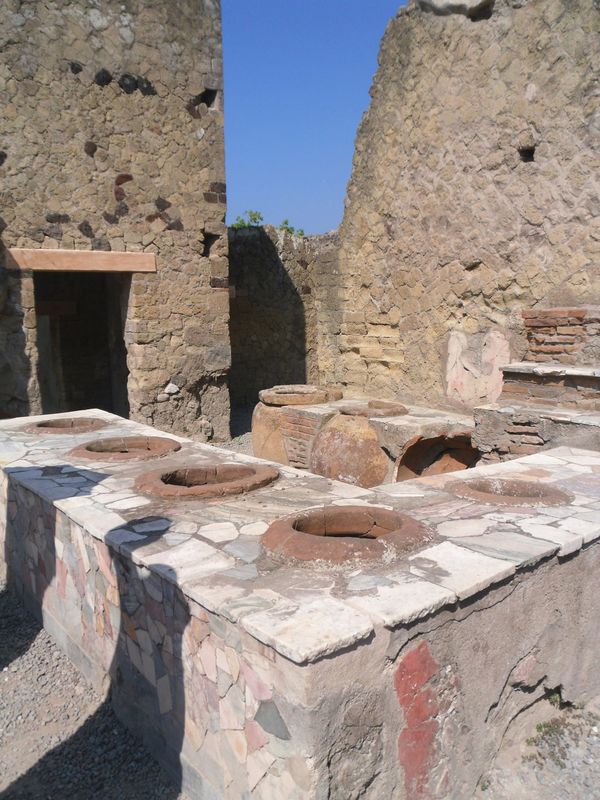 Roman thermopolium (equivalent of a modern fast-food) in Herculaneum, Campania, Italy 