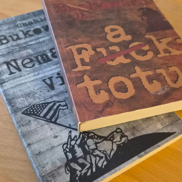 Two books are lying on the table.
