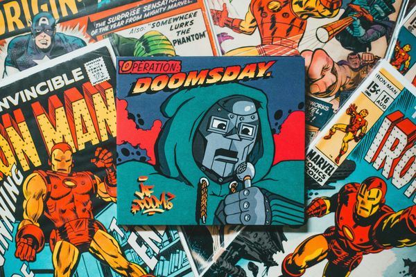Comic books laying on top of each other