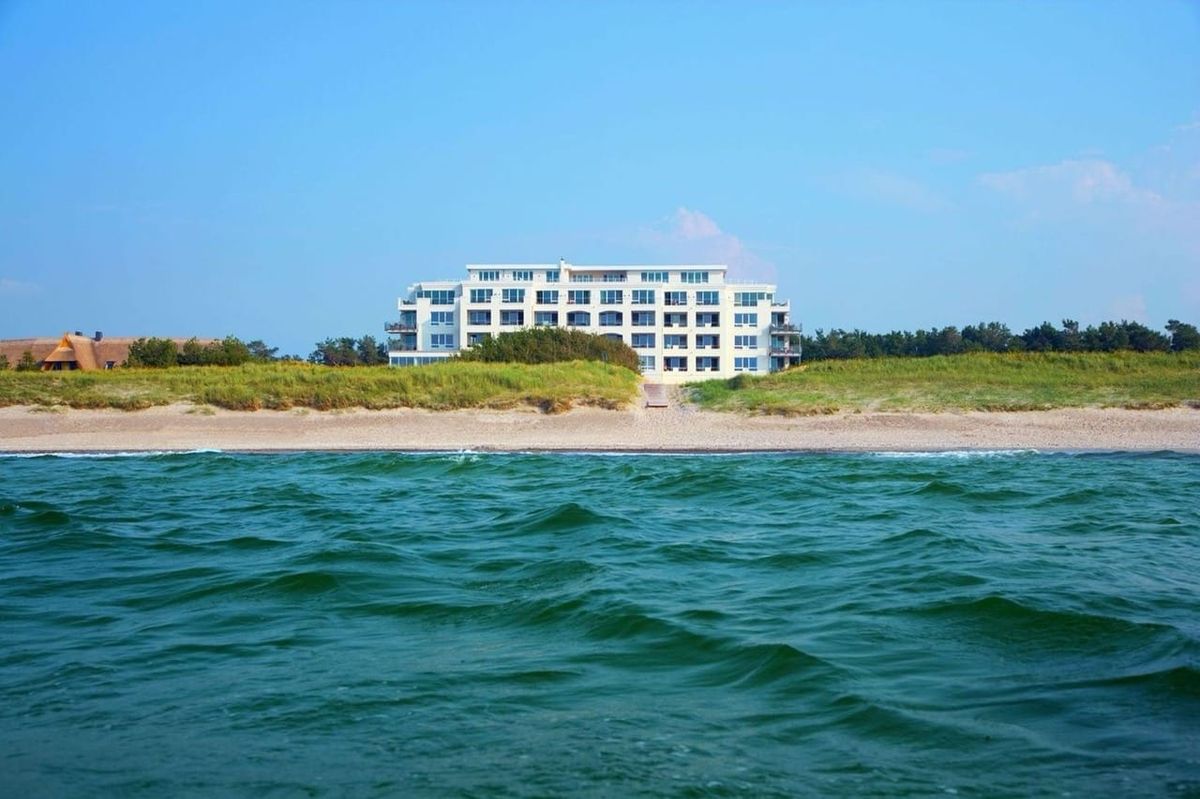 Strandhotel Dünenmeer in Dierhagen on Germany's Baltic coast. Surrounded by the sea, dunes and coastal woodland, the hotel has redefined its identity following an extensive renovation.