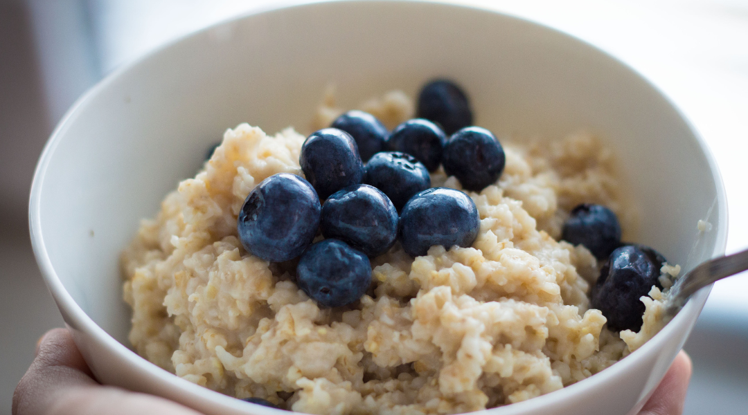 Oatmeal with Blueberries, Hemp Hearts, and Drizzle of Maple Syrup