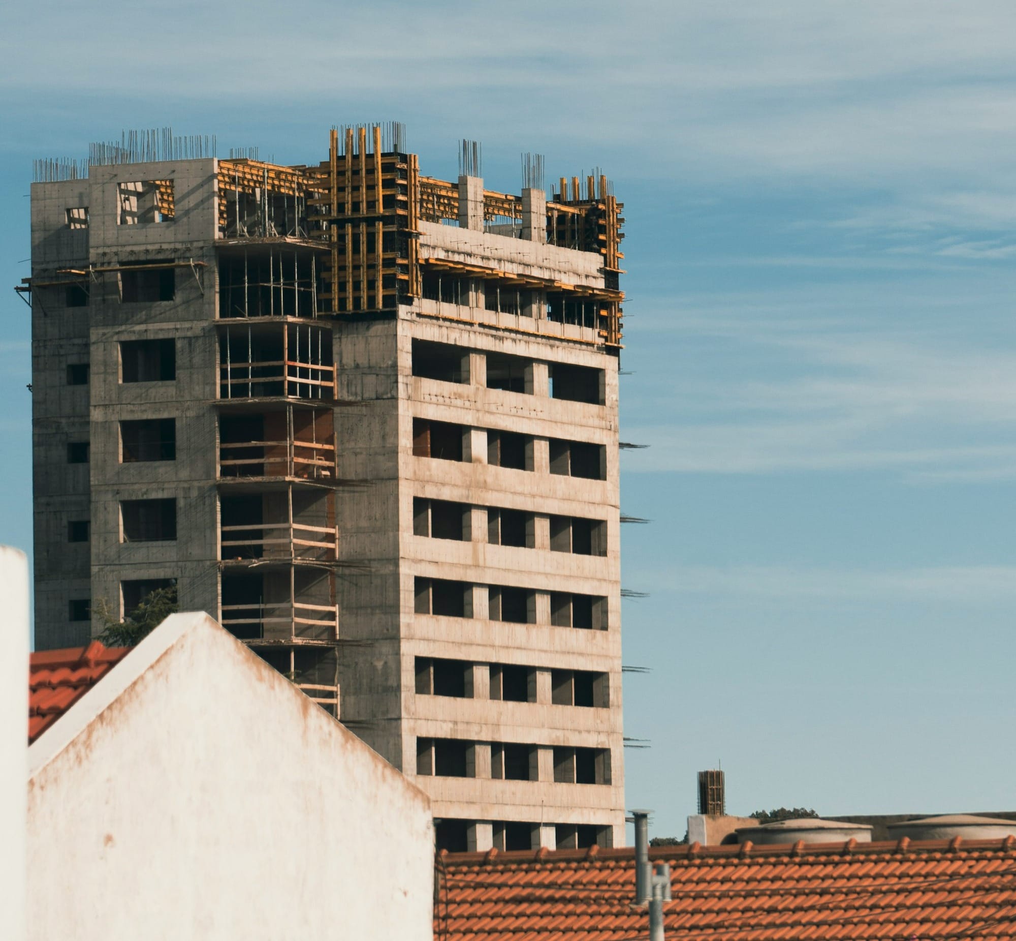 a tall building with scaffolding on top of it