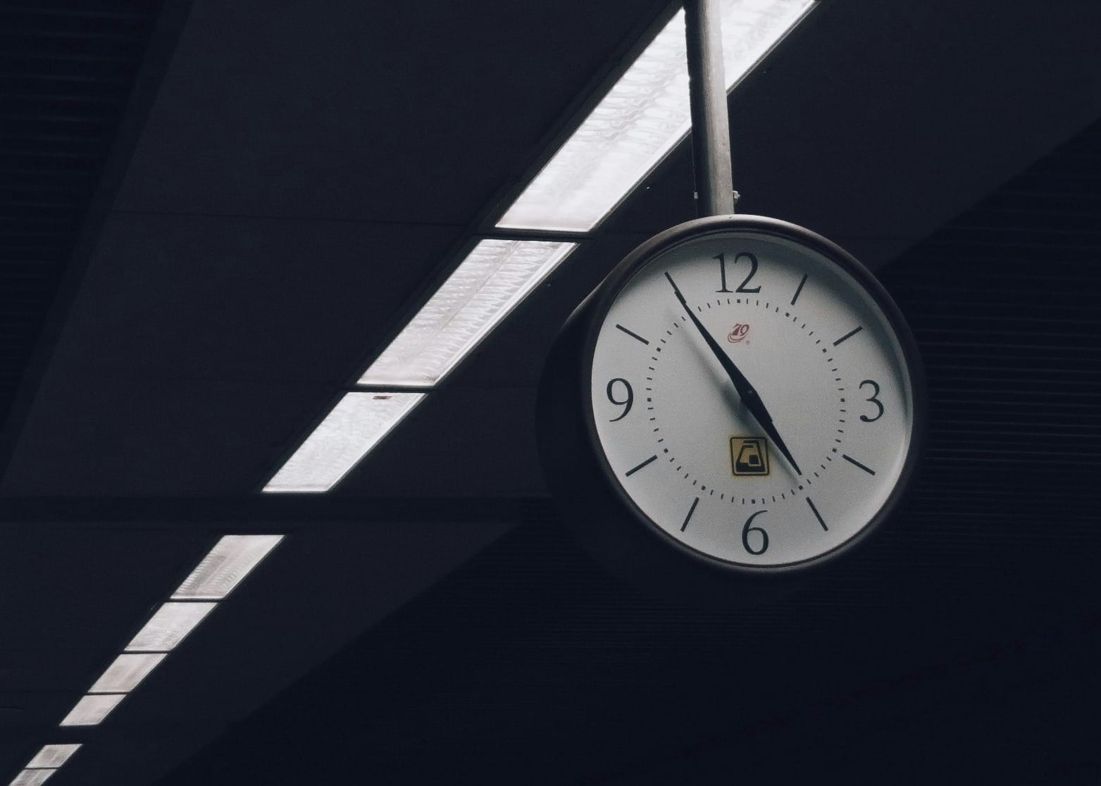 analog clock at 5:55