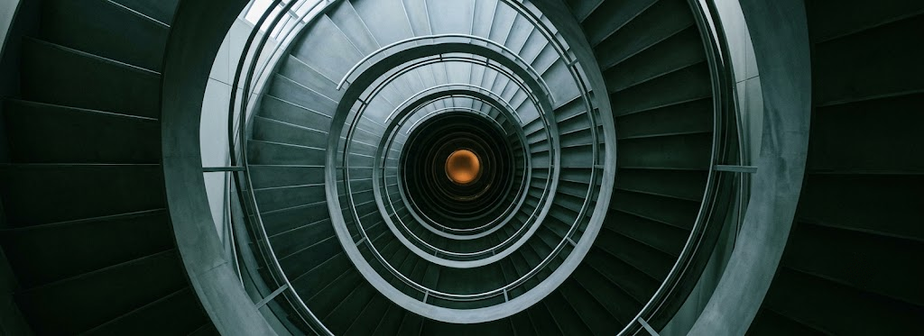 A spiral staircase seen from directly below