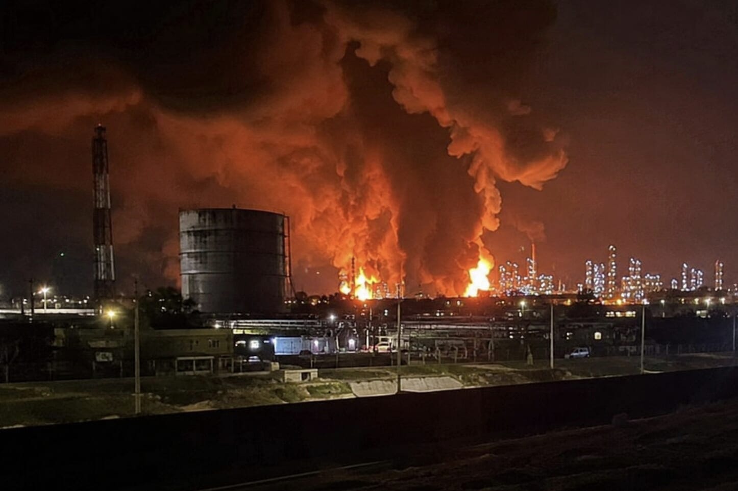 Industrial fires and smoke at night