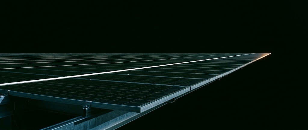 A solar array edge-on against black sky