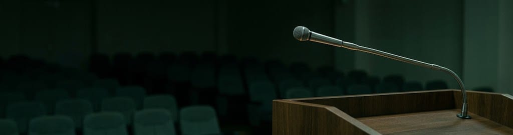 A microphone on an empty podium
