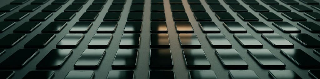 A wall of dark phone screens