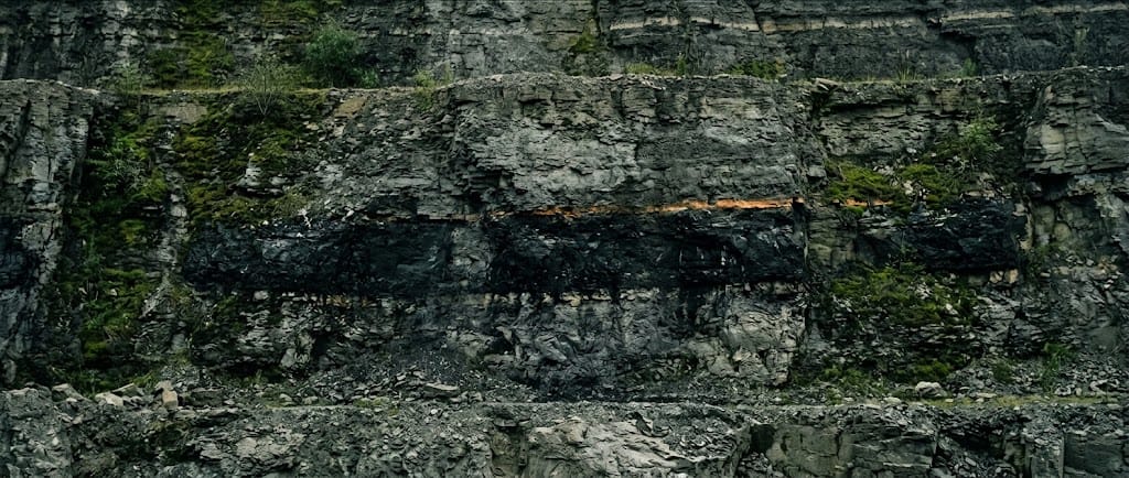 A raw coal seam exposed in rock