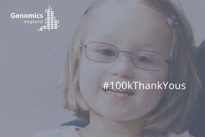 A girl smiling at the camera. A still from a film produced for Genomics England by Restless Communications