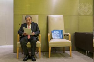 Secretary-General António Guterres reviews his notes ahead of the opening of the UN Climate Action Summit.