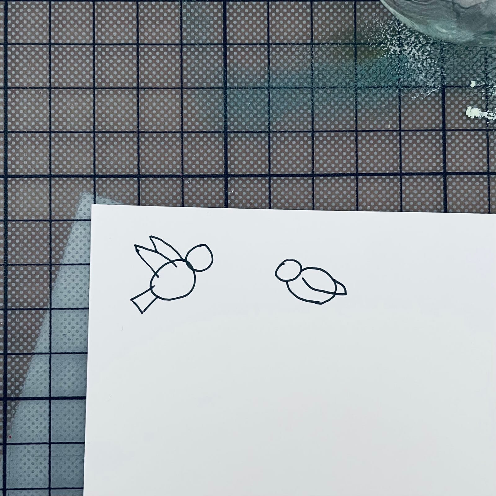 A sketch of very simple birds.