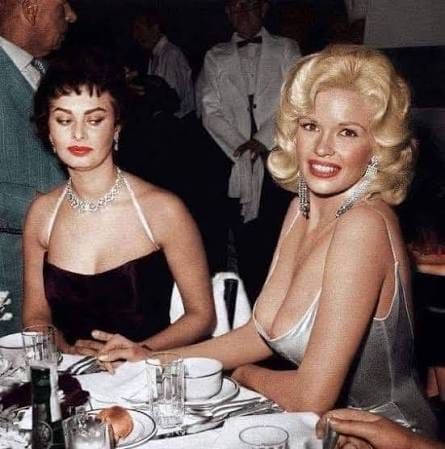 Women feign friendship face to face but secretly dislike each other.