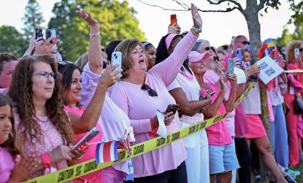 They wore pink. They held signs that said “Believe” and “Peace for Lindsay.” They applauded her defense attorney. They said the Lord’s Prayer and made hearts with their hands.