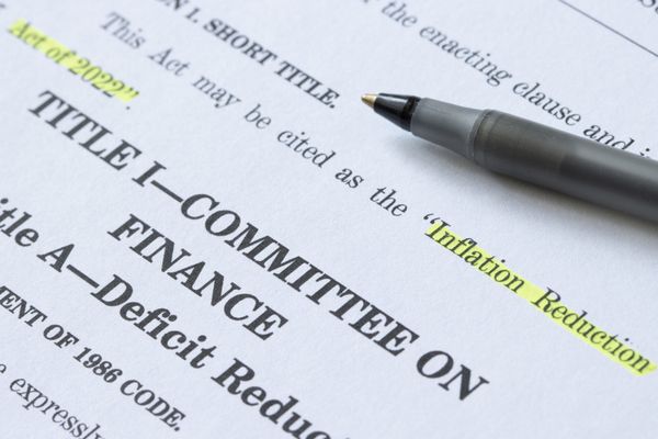 Closeup of the documents of the Inflation Reduction Act of 2022. The Unites States Senate passed the Inflation Reduction Act,