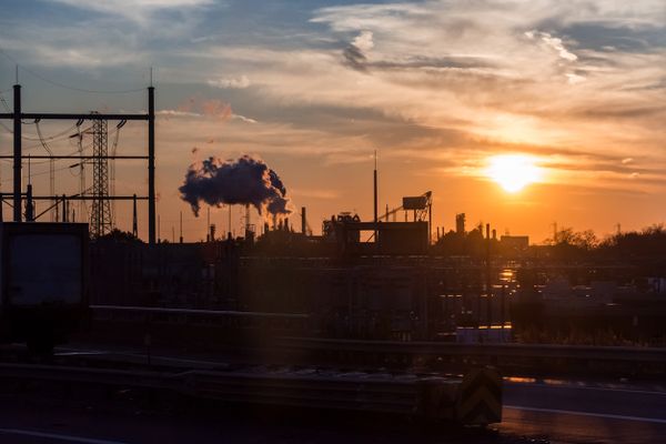 The sunsets with view of industrial smokestacks as seen from the NJ Turnpike.