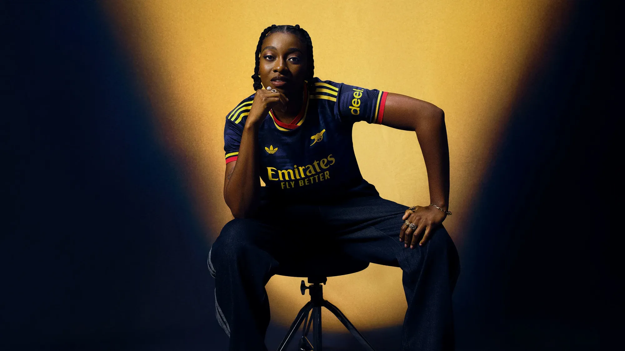 Music artist Little Simz models the new Arsenal 26/27 away jersey | 📸 arsenal.com