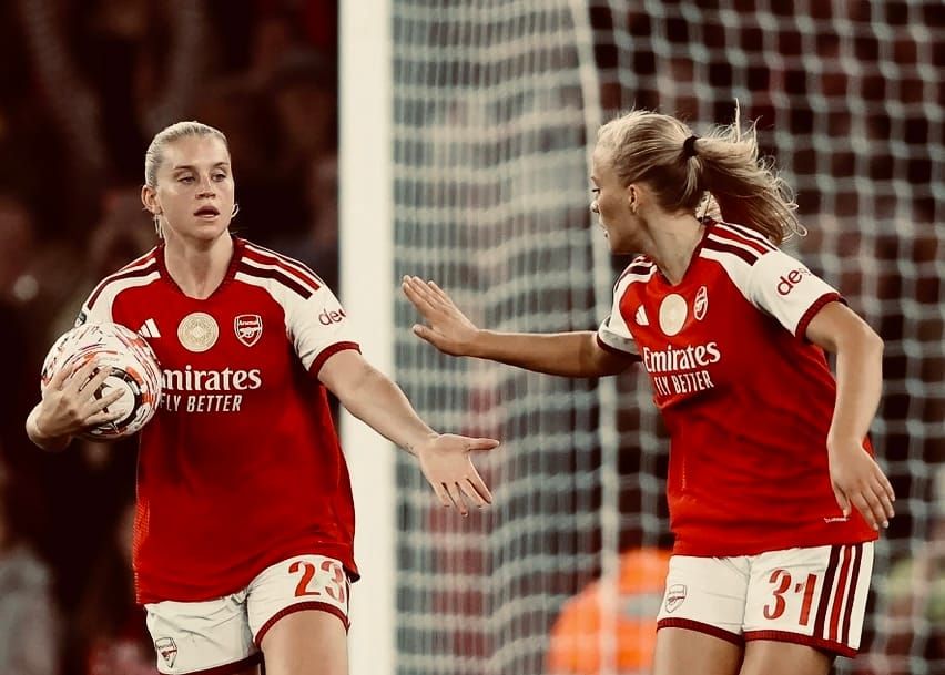 Smilla Holmberg celebrates scoring her equaliser against Manchester United with Alessia Russo